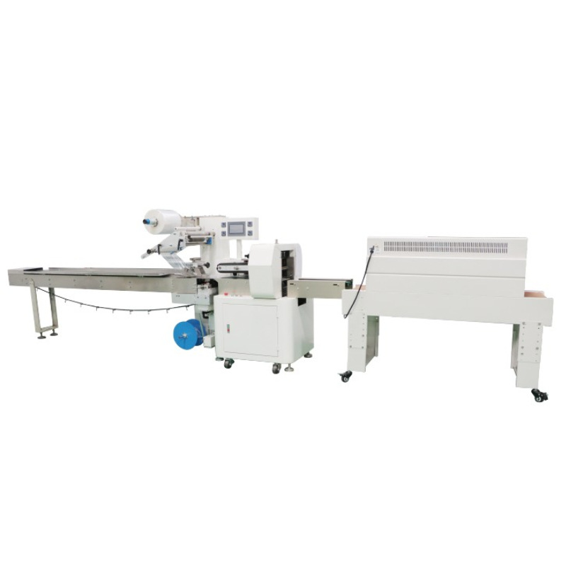 Pillow type heat shrink packaging machine